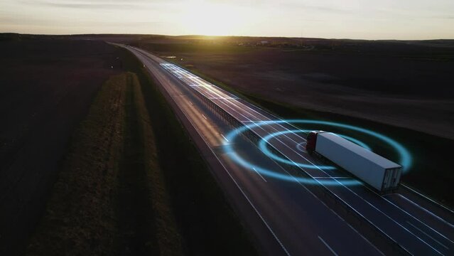 AI Visualization Concept: autonomous truck driving on autopilot on a highway with traffic sensors scanning surroundings. Artificial intelligence. Self driving. Car Scan, GPS Tracking, Smart Roads, 4k.