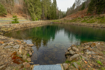 Klinovecky creek and reservoirs near Jachymov town in spring morning