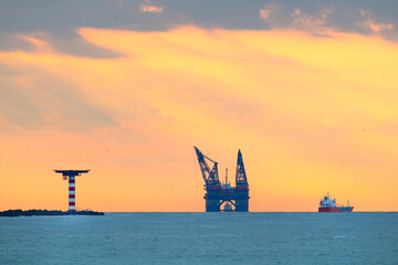 Oil rig at the sea - 773424495
