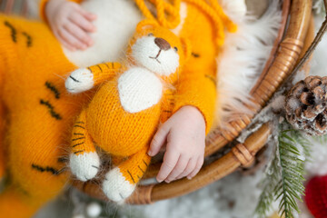 little newly born child with a toy. photo session of the newborn. sleeping baby