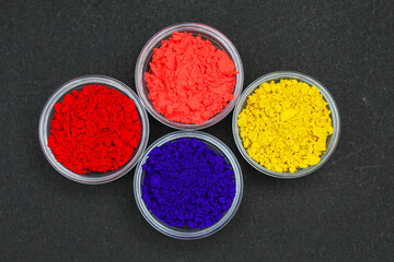 Indian Holi festival colors powder top view 