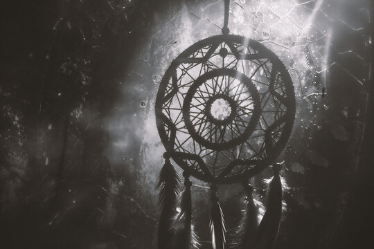 Dream catcher with feathers threads and beads rope hanging. Dreamcatcher handmade