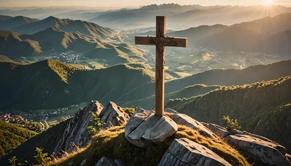 Fotobehang Wooden cross in the mountains at sunset. © valentin_b90