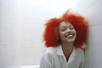 a girl in white clothes and red hair, in white room - obrazy, fototapety, plakaty