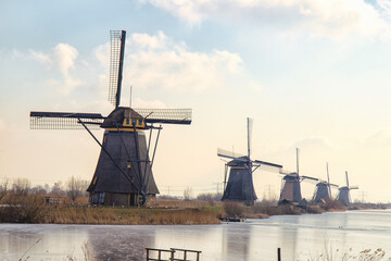 Dutch windmills, in use for make flower en sawing wood mostly for small hobby business - obrazy, fototapety, plakaty