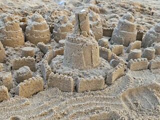 Fortress castle bulit on the beach with wet sand