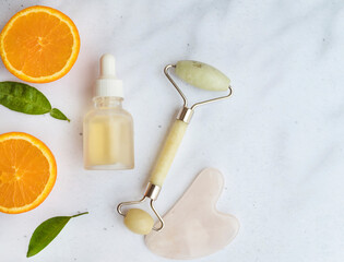 Vitamin C serum with orange fruit