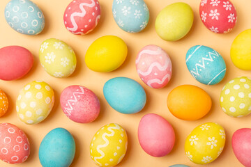 Easter eggs on a bright background. Easter celebration concept. Colorful easter handmade decorated Easter eggs. Place for text. Copy space.