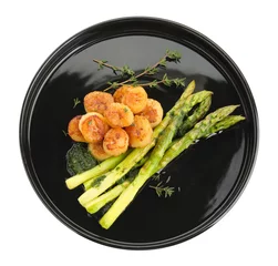 Fotobehang Delicious fried scallops with asparagus and thyme isolated on white, top view © New Africa