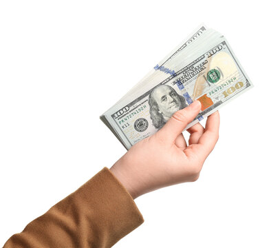 Money exchange. Woman holding dollar banknotes on white background, closeup