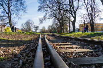 Old railway tracks on the bank of the river in the industrial part of the city of Brno, Czech...