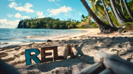 Poster The word "RELAX" in wooden letters on tropical beach, retro style text, sunny calm seacoast background, blue sky with clouds, summer design for beach vacation resort advertising banner with copyspace  © Vladislava
