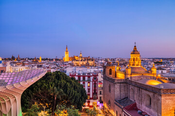 Seville City Skyline view with Illuminated Space Metropol Parasol in the Foreground at Dusk, Seville