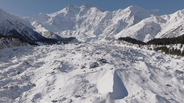 Snowy Nanga Parbat at Winter. Aerial Drone Shot with a glacier in valley, Fairy Meadows Pakistan, Mount Killer at Dawn