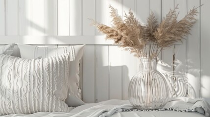 A vase filled with dried plants on a bed. Suitable for home decor themes - obrazy, fototapety, plakaty