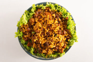 Baião de Dois traditional Brazilian food made with rice, beans, sausage and rennet cheese