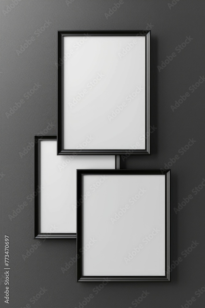 Aufkleber Simple and versatile image of three empty frames on a wall, ideal for interior design concepts
