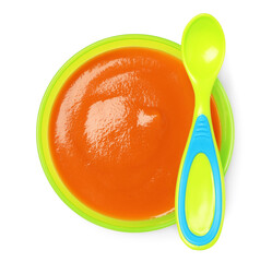 Delicious baby food in bowl and spoon isolated on white, top view