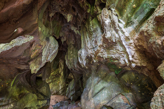 Inside the scenic Khlong Chak Bat Cave with stalactites and other rock formations in Koh Lanta, Thailand.