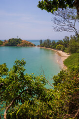 Scenic view of sea, beach and lush nature from above at the Mu Ko Lanta National Park in Koh Lanta, Thailand, on a sunny day.