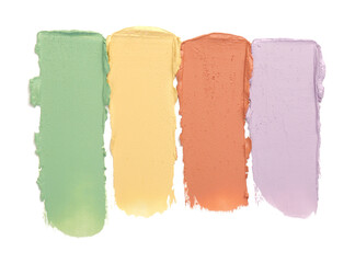 Samples of color correcting concealers isolated on white, top view