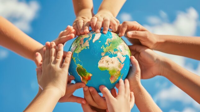 International Children's Day. Children from around the world hold globes, showcasing unity against a blue sky on Children's Day