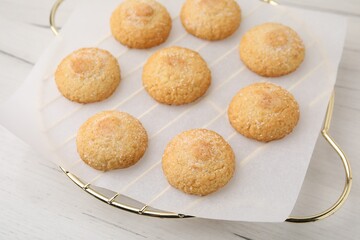 Tasty sweet sugar cookies on white wooden table, closeup
