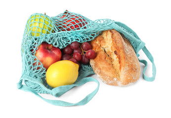 String bag with fresh fruits and baguette on white background