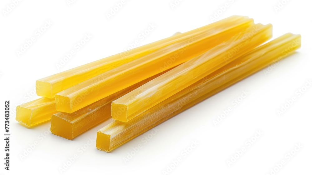 Poster a bunch of yellow sticks on a white surface, suitable for various design projects