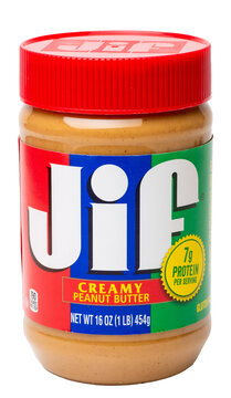 Plastic jar of Jif brand creamy peanut butter isolated on a transparent background PNG