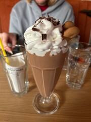 Gatherings in a cafe are a very tasty, big sweet drink.