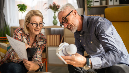 Couple at home connect and install cctv security surveillance camera