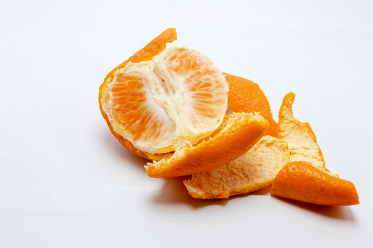 peeled tangerine on a white background