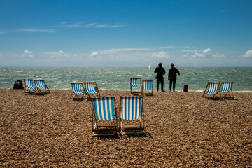 Deck chairs on Brighton beach