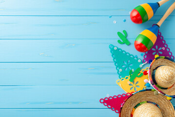 Festive Cinco de Mayo composition. Overhead view featuring symbolic items: sombreros, maracas, flag...