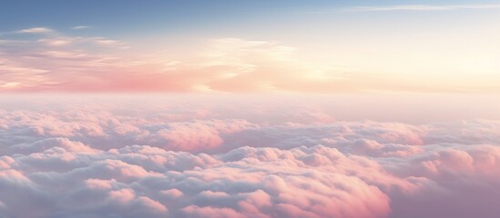The peaceful view of the sky is filled with tranquil fluffy clouds, creating a calming and picturesque scene - obrazy, fototapety, plakaty