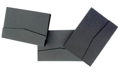 three thick black bound notebooks isolated