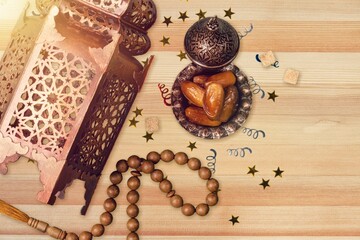 Festive Ramadan composition, ornamental lantern and confetti