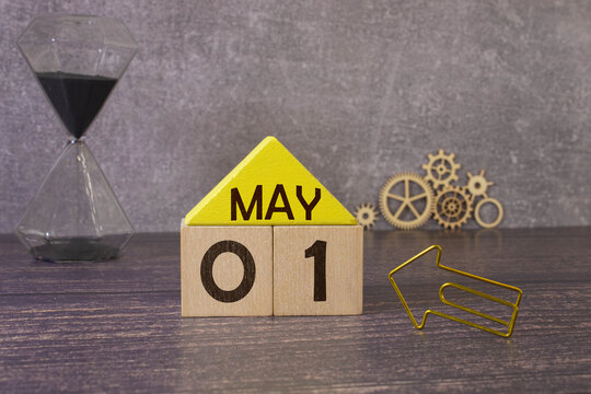 May 1st. Image of may 1 wooden color calendar on white background.