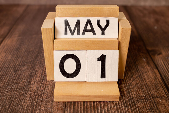 May 1st. Image of may 1 wooden color calendar on white background.