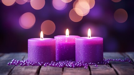 Obraz na płótnie Canvas Purple candles casting warm light on a glittering surface