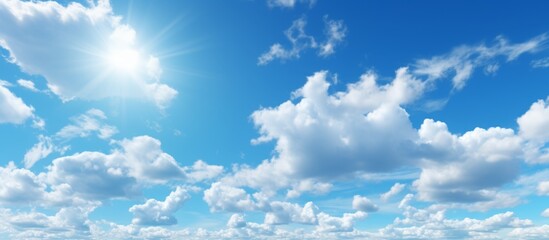 A serene sky dotted with fluffy clouds on a beautiful sunny day, creating a peaceful and calming atmosphere