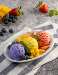  ice cream with fresh berries in a bowl