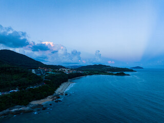 Aerial photography of Jiajing Island, Shimei Bay, Wanning, Hainan, China, in summer evening