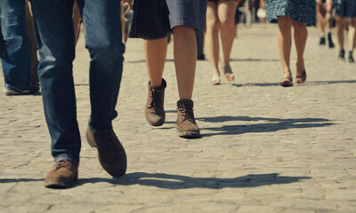 National Walking Day, people walking on gravel tarmac road on a summers day