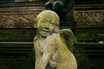 Stone sculpture in the Monkey Forest, Ubud, Bali, Indonesia.