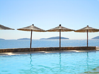 Sun shades with sea, sky and islands