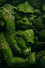 Closeup of Monkey Statue in Monkey Forest, Ubud, Bali, Indonesia.