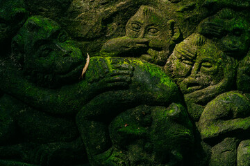 Fototapeta na wymiar Closeup of Monkey Statue in Monkey Forest, Ubud, Bali, Indonesia.