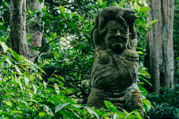 Statue in the Monkey Forest, Ubud, Bali, Indonesia.